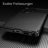A close-up, angled view of a black smartphone case with a carbon fiber texture, resting on a ribbed surface. The text 'Exakte Freilassungen' is visible at the top. Produktbild-Vorschau
