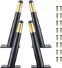 Four black and gold furniture legs are displayed on a white background, with a set of screws to the right. Produktbild-Vorschau