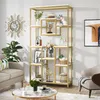 A living room scene featuring a gold and white bookshelf filled with decorative items. Produktbild-Vorschau