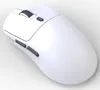 A white gaming mouse is shown from a slightly elevated angle against a light gray background. Produktbild-Vorschau