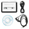 A collection of items for a portable cassette player, including the player itself, a USB cable, earphones, and a CD. Voir les images du produit