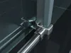 A close-up view of a shower door hinge and track system. Produktbild-Vorschau