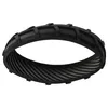 A black rubber wheel cover with a tread pattern. Produktbild-Vorschau