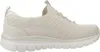 A side view of a beige Skechers sneaker. Produktbild-Vorschau