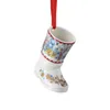 A ceramic Christmas stocking ornament with a winter scene and a reindeer. Produktbild-Vorschau