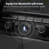 Close-up of a car's center console with a Bluetooth adapter plugged into a USB port. Náhled obrázku produktu