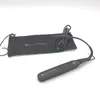 A black hair straightener with a pink accent and a black carrying bag are laid out on a white surface. Podgląd zdjęcia produktu