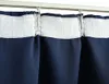 Close-up view of dark blue curtains hanging from a white curtain rod. Podgląd zdjęcia produktu