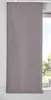 A grey sliding curtain panel hangs in front of a window, partially obscuring the view of greenery outside. A small decorative item with the letter 'B' is visible on the windowsill. Produktbild-Vorschau