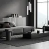 A modern living room with a gray sofa, a coffee table, and a large window overlooking a landscape. Anteprima dell’immagine prodotto