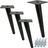 Four black metal furniture legs and a pile of screws on a white background. Podgląd zdjęcia produktu