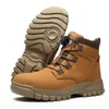 A pair of tan work boots with a brown sole and collar, shown against a white background. One boot is upright, and the other is lying on its side, showing the sole. Produktbild-Vorschau