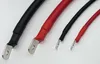 Close-up view of several battery cables with ring terminals. Produktbild-Vorschau