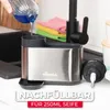 A Vileda dish soap dispenser is being refilled with blue liquid soap next to a kitchen sink. Anteprima dell’immagine prodotto