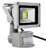 A close-up studio shot of a motion-activated LED floodlight. Produktbild-Vorschau
