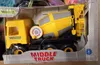 A toy cement mixer truck in its retail packaging. Voir les images du produit