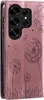 A pink flip phone case with a dandelion design. Produktbild-Vorschau