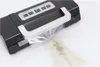 A vacuum sealer machine with a bag of fish being sealed. Podgląd zdjęcia produktu