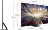 A side profile and a front view of a large television with dimensions indicated by measurement lines and text. Voir les images du produit