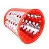 A close-up studio shot of a red and silver grater attachment. Produktbild-Vorschau