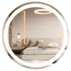 A bedroom scene with a bed and a round mirror with LED lighting. Podgląd zdjęcia produktu
