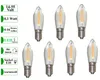 A product shot of seven LED filament light bulbs arranged in two rows against a white background, with informational text boxes on the left. Produktbild-Vorschau