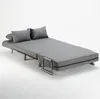 A gray sofa bed is shown in a studio setting against a white background. Produktbild-Vorschau