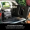 A grill and its stand are being loaded into the trunk of a car. Náhľad obrázku produktu
