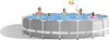 A family is enjoying a swimming pool on a sunny day. Produktbild-Vorschau