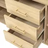 Close-up of wooden drawers with gold handles on a white background. Podgląd zdjęcia produktu