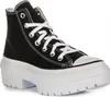 A black high-top sneaker with a thick white platform sole and white laces, shown against a white background. Náhľad obrázku produktu