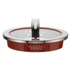 A close-up, studio shot of a red pot lid with a glass insert and a metal handle. Podgląd zdjęcia produktu