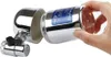 A hand is holding a chrome water filter attachment for a faucet. Produktbild-Vorschau
