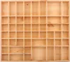 An empty wooden organizer box with multiple compartments. Produktbild-Vorschau