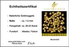 A certificate of authenticity for gold nuggets, featuring a picture of the nuggets and details about their origin and purity. Produktbild-Vorschau