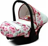A baby car seat with a floral pattern. Produktbild-Vorschau