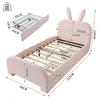 A diagram showing the dimensions of a pink children's bed with bunny ears, along with a separate diagram of a storage basket. Anteprima dell’immagine prodotto