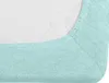 A close-up view of a mint-colored fitted sheet, showing the texture of the fabric and the elasticized edge. Náhled obrázku produktu