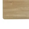 A close-up view of a light brown wood grain texture, likely a tabletop or surface. Náhled obrázku produktu