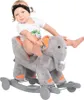 A baby is riding a plush elephant rocking toy. Voir les images du produit