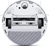 The underside of a white robot vacuum cleaner is shown against a white background. Voir les images du produit