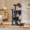 A multi-level cat tree with two cats on it, placed in a living room setting next to a cabinet and a lamp. Produktbild-Vorschau