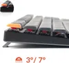 A close-up side view of a mechanical keyboard, showing the angled keys and the tilt mechanism at the bottom. An inset image shows a different angle of the keyboard. Produktbild-Vorschau