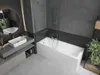 A modern bathroom with a bathtub, sink, and vanity. Náhled obrázku produktu