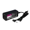 A black laptop power adapter with its cord is shown against a white background. Produktbild-Vorschau