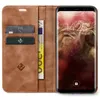 A brown leather flip case for a Samsung Galaxy S8 phone, shown open with cards and currency inserted. Produktbild-Vorschau