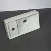A white ceramic sink with two holes is placed on a dark gray surface with a white background. Podgląd zdjęcia produktu