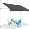 An outdoor patio scene with a gray awning extended over a glass-topped table and four blue chairs. Produktbild-Vorschau