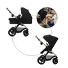 A collage showing a black and gold Kinderkraft MOOV 2 XL 3in1 Kombikinderwagen in different configurations and a close-up of a man assembling it. Voir les images du produit