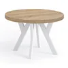 A round dining table with a wood-effect top and white criss-cross legs, presented on a white background. Voir les images du produit